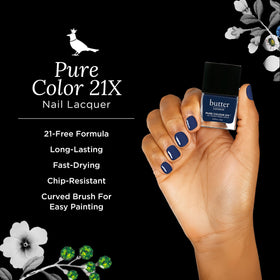 Butter LONDON PC21X Brolly brush stroke highlights glossy finish.