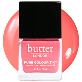 Butter LONDON PC21X Trout Pout bottle displays the glossy coral finish for a vibrant manicure.