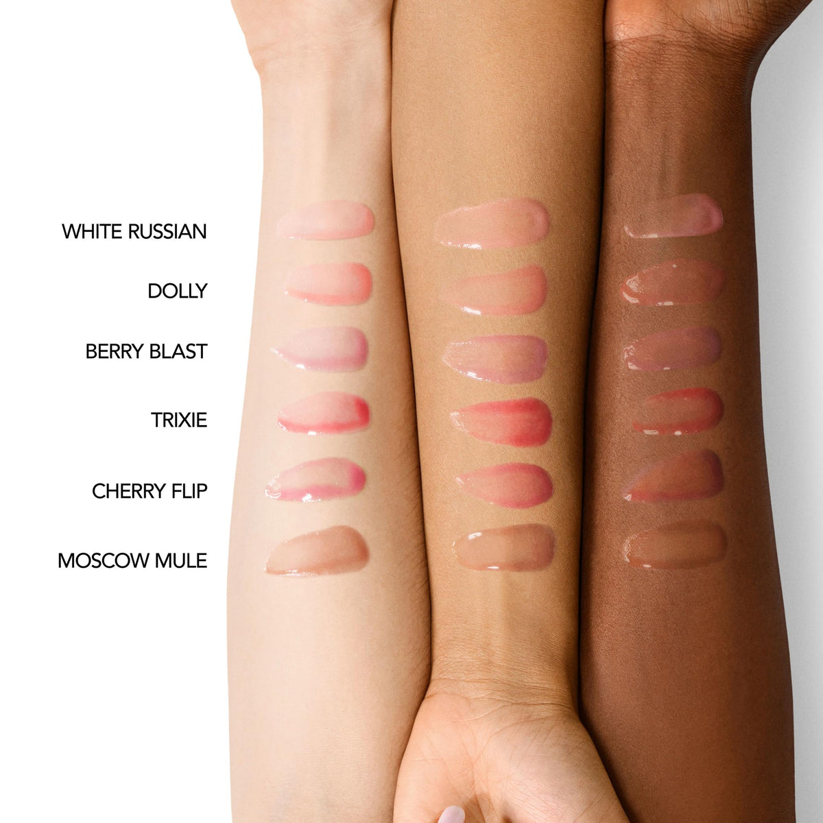 Dolly lip oil swatches reveal creamy color and glow