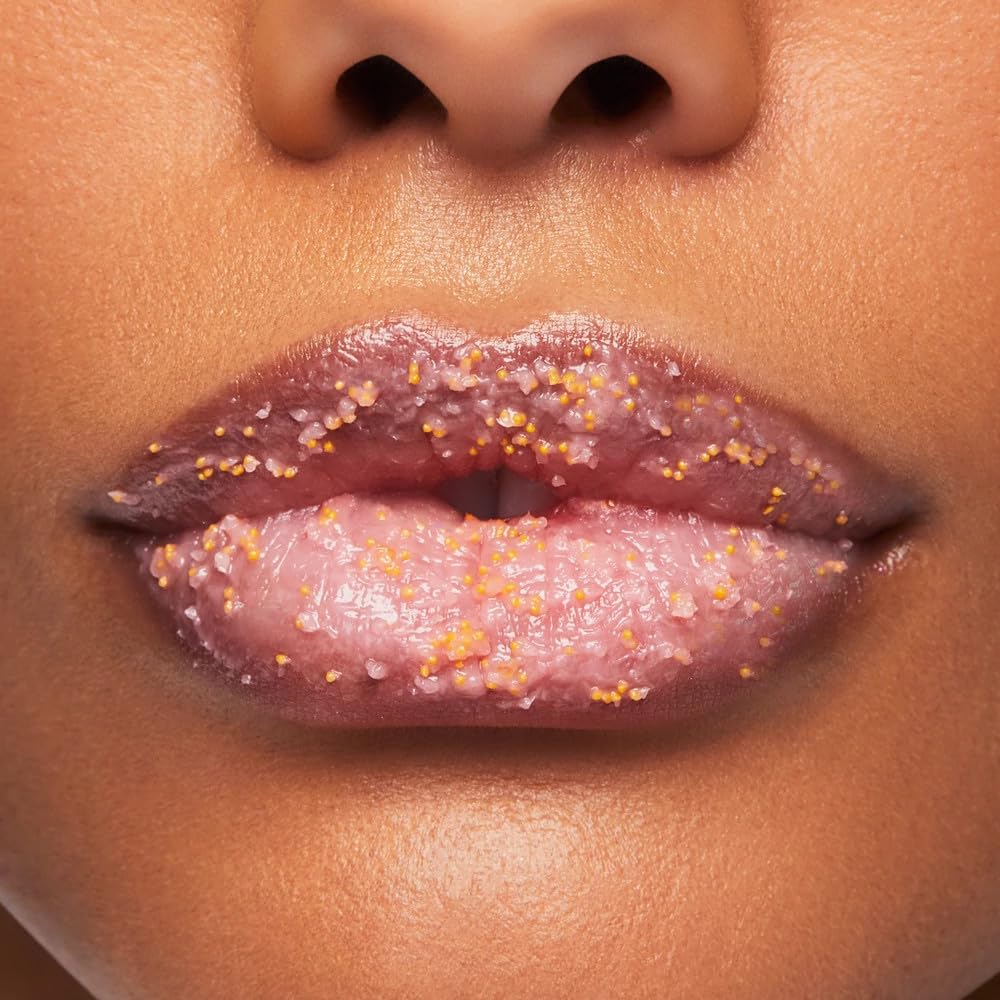 Close-up of sugar grain texture from BUXOM Lip Scrub for gentle buffing