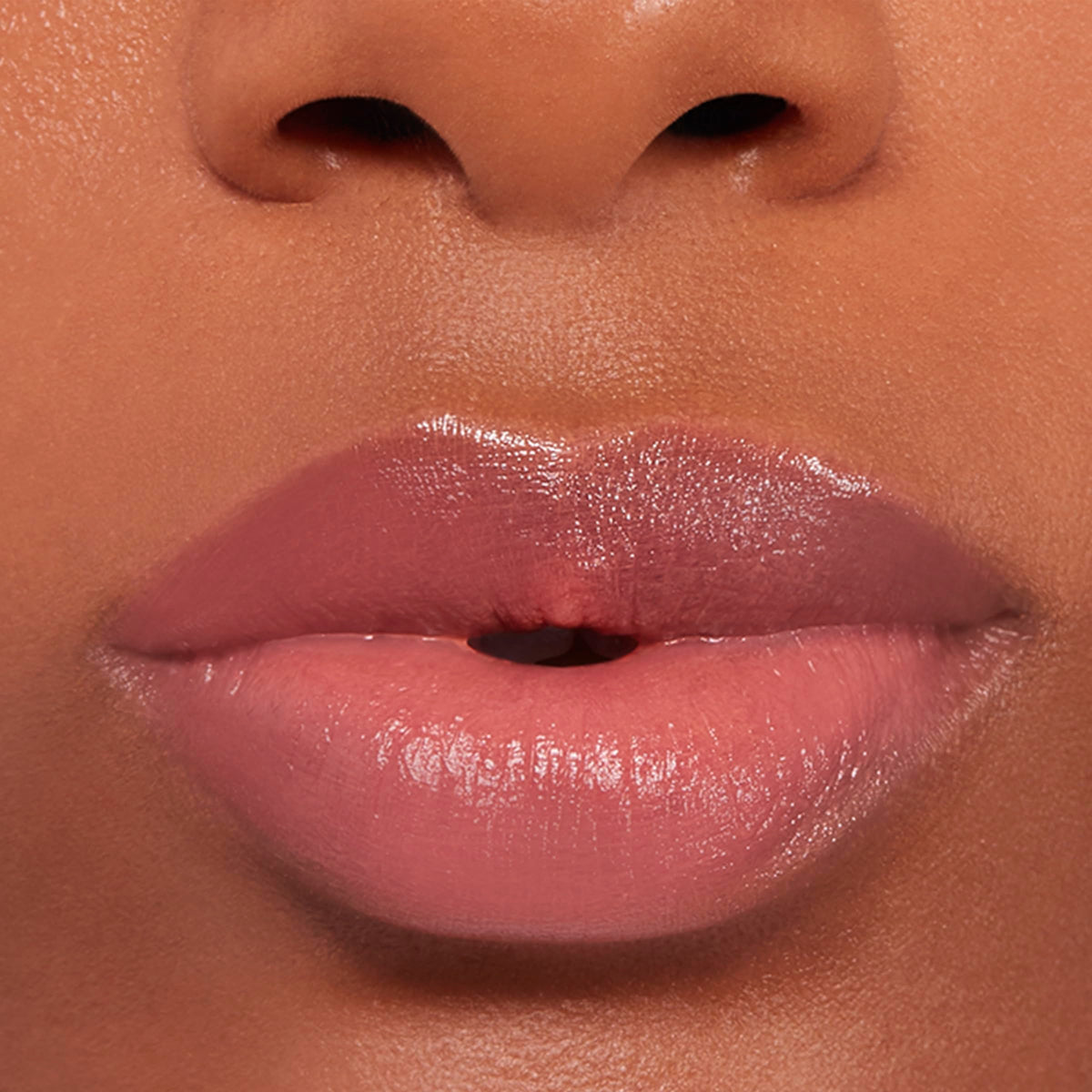 BUXOM Power-Full Lip Balm Inner Glow packaging highlighting cruelty-free statement.