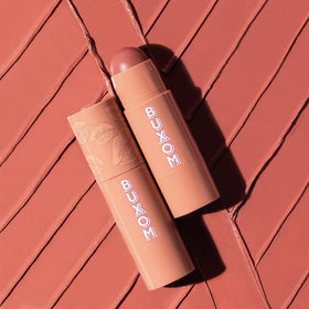 BUXOM Power-Full Lip Balm Inner Glow satin sheen on lips.
