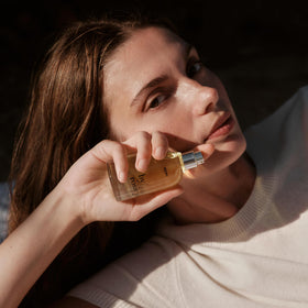 By Rosie Jane Remi travel-size bottle ideal for on-the-go scent.