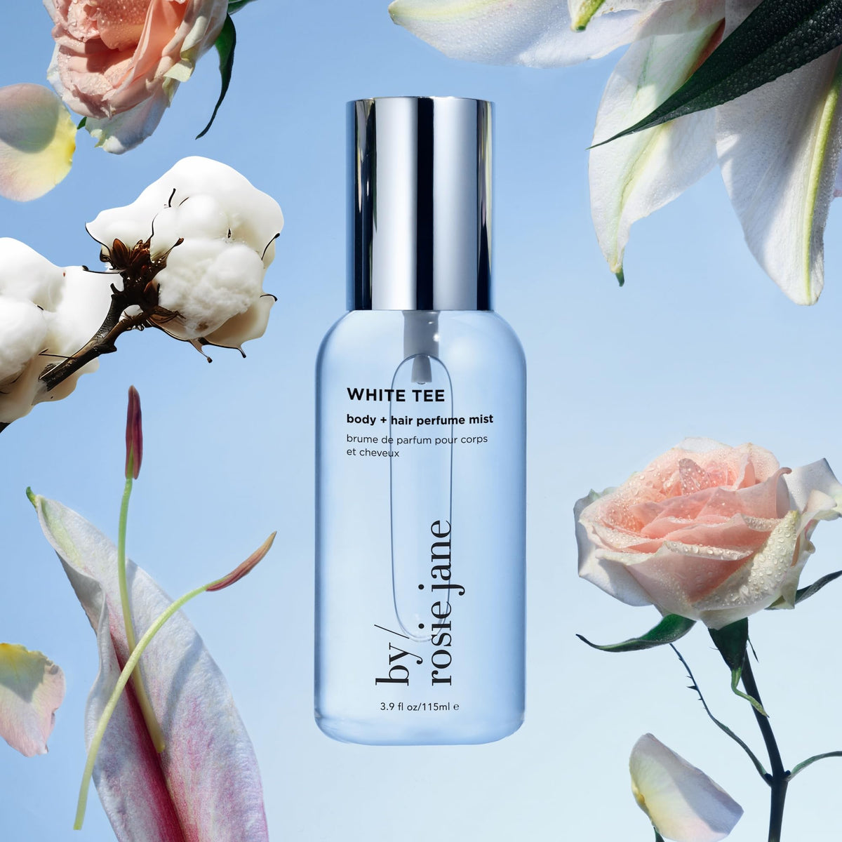 By Rosie Jane White Tee spray in hand, misting for effortless scent