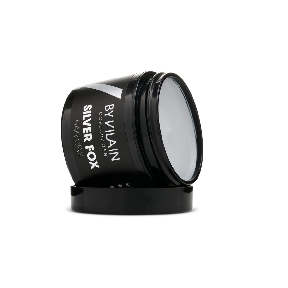 By Vilain Silver Fox Mud Wax comes in a sleek 2.2oz jar for travel-ready grooming.