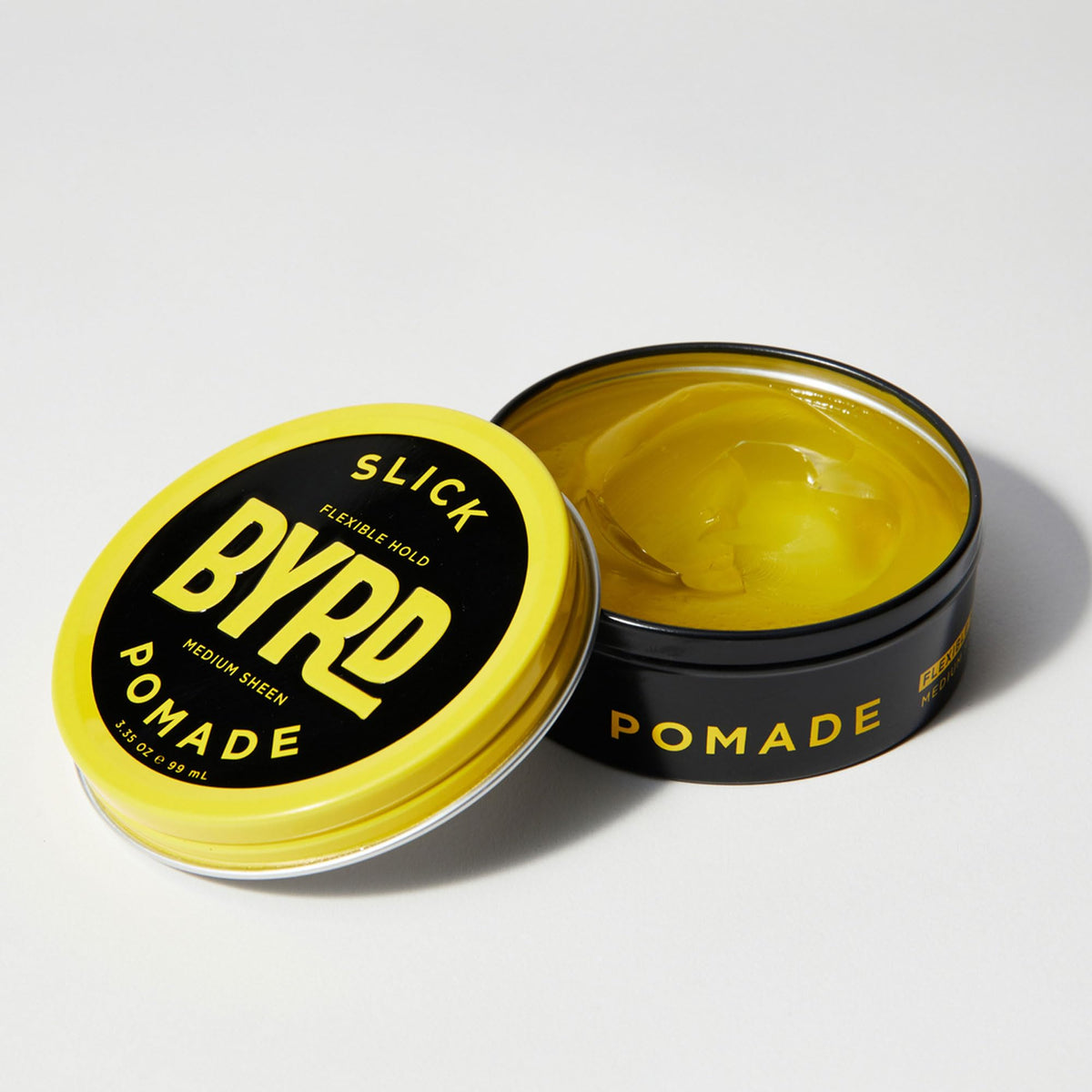 BYRD Hairdo Slick Pomade two-pack back view highlights compact, travel-friendly packaging.