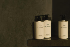 Byredo Bal D'Afrique shampoo bottle with pump highlights hotel-grade presentation.