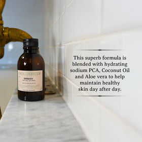 Label close-up shows coconut oil and aloe vera for skin softness