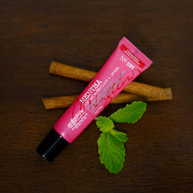 Lips wearing glossy, lightweight shine with a tingly feel.