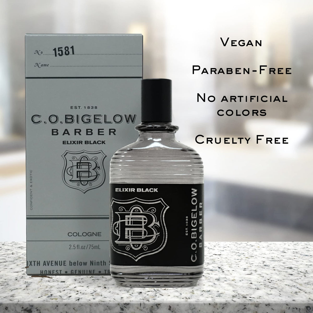 C.O. Bigelow Elixir Black glass appearance on vanity, refined style