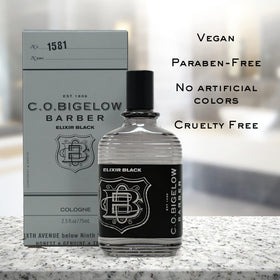 C.O. Bigelow Elixir Black glass appearance on vanity, refined style