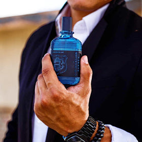 C.O. Bigelow Elixir Blue bottle on vanity for a crisp, confident presence