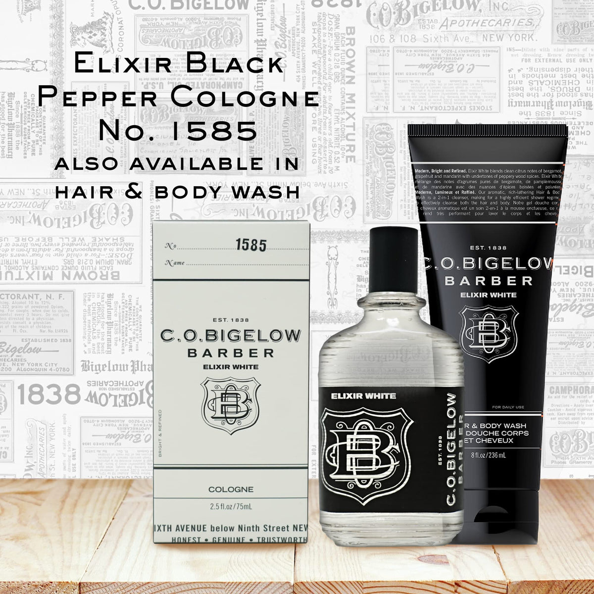 C.O. Bigelow Elixir White glass bottle on a vanity display.