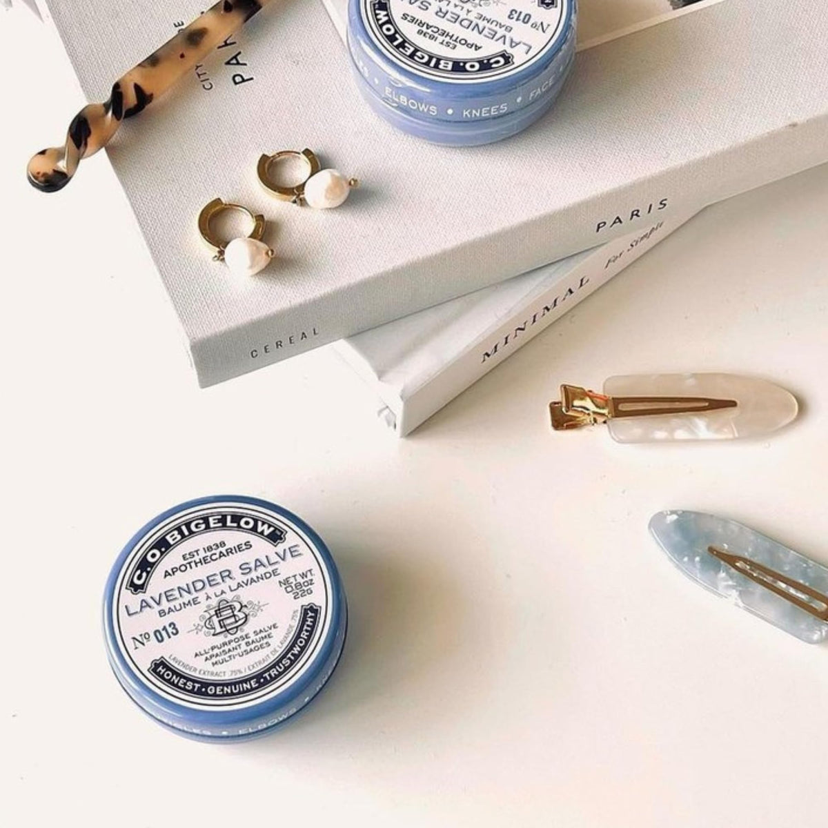 Desk-ready Lavender Salve Tins in a bag for quick touch-ups.