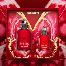 Cacharel Amor Amor bottle grenade angled closeup highlighting vibrant red hue and floral-fruity notes