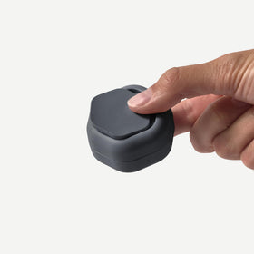 Cadence three small capsules in-use show easy transfer and portion control.