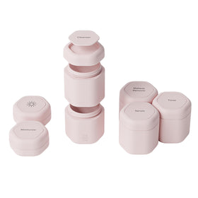 Cadence travel containers with petal lids for a complete skincare set on the go.