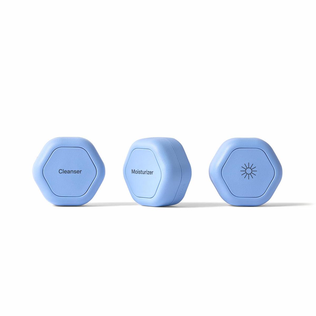 Cadence travel containers with magnetic lids demonstrate secure, space-saving storage.