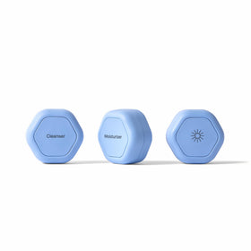 Cadence travel containers with magnetic lids demonstrate secure, space-saving storage.