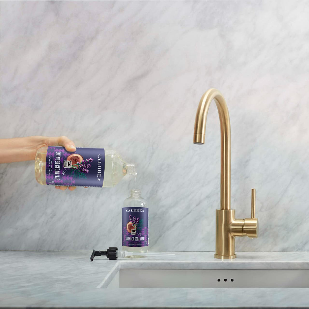 Caldrea Lavender Cedar Leaf label on countertop signals convenient eco-friendly use.