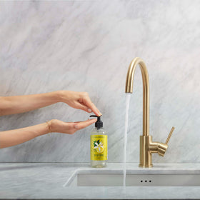 Caldrea Sea Salt Neroli hand wash foam closeup highlighting rich lather.
