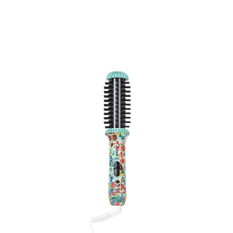 Calista GoGo Mini round brush compact for on-the-go styling.