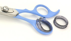 Calming Clipper cape and accessories to help contain mess.