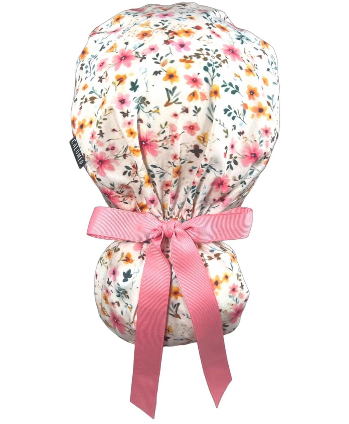 CALOMED scrub cap with buttons and ribbon on ivory flowers, comfortable all day wear