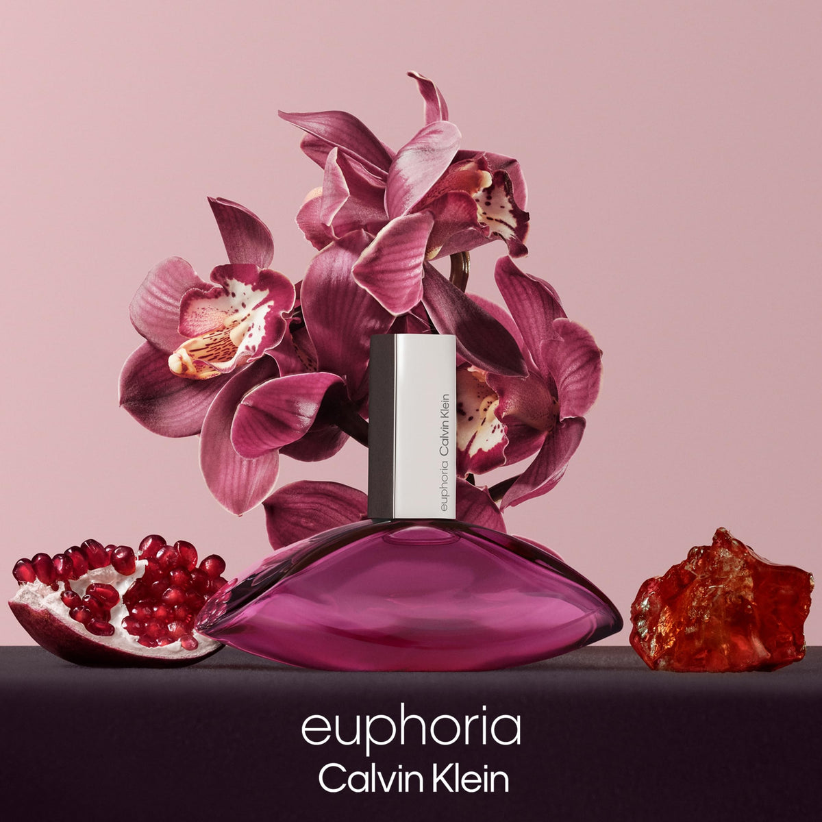 Calvin Klein Euphoria amber liquid and mahogany wood base evoke warmth.