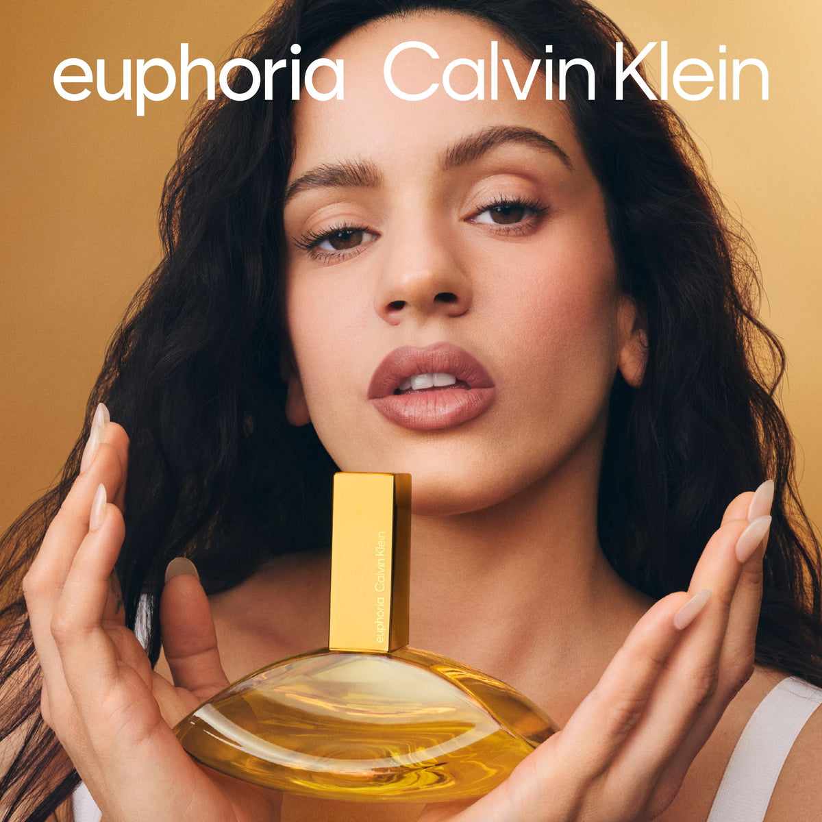 Calvin Klein Euphoria Solar Elixir bottle cap detail with luxe design.