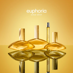 Calvin Klein Euphoria Solar Elixir mango essence close-up conveys juicy brightness.