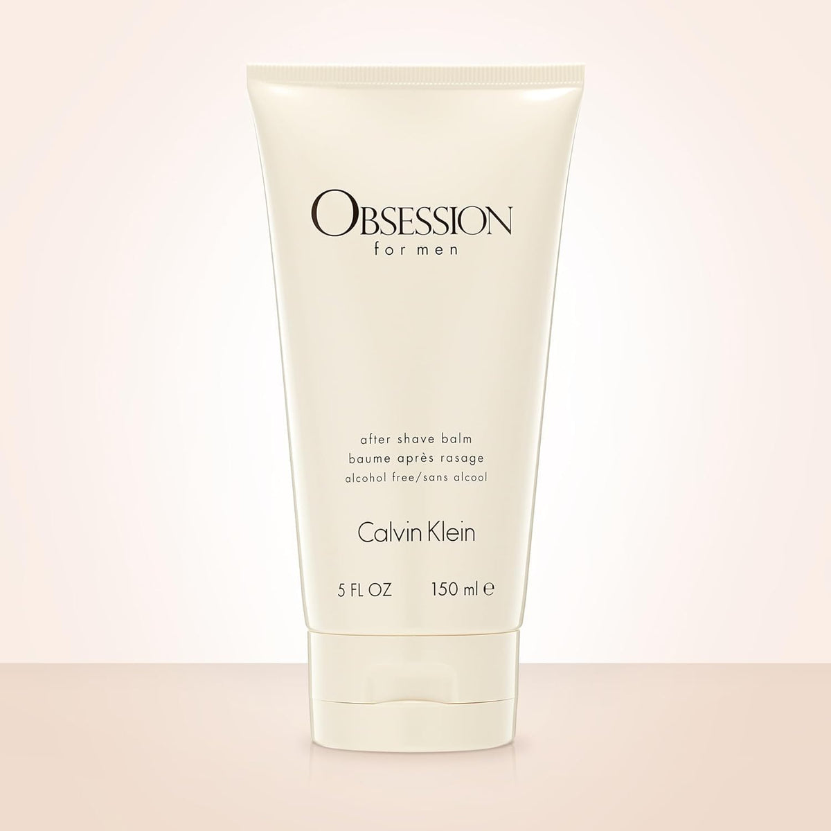Calvin Klein Obsession for Men balm being applied, soothing skin after shaving.