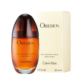 Close-up of Obsession label highlighting bold oriental fragrance design.