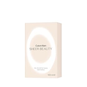 Calvin Klein Sheer Beauty flacon with peach accents for a fresh floral vibe.