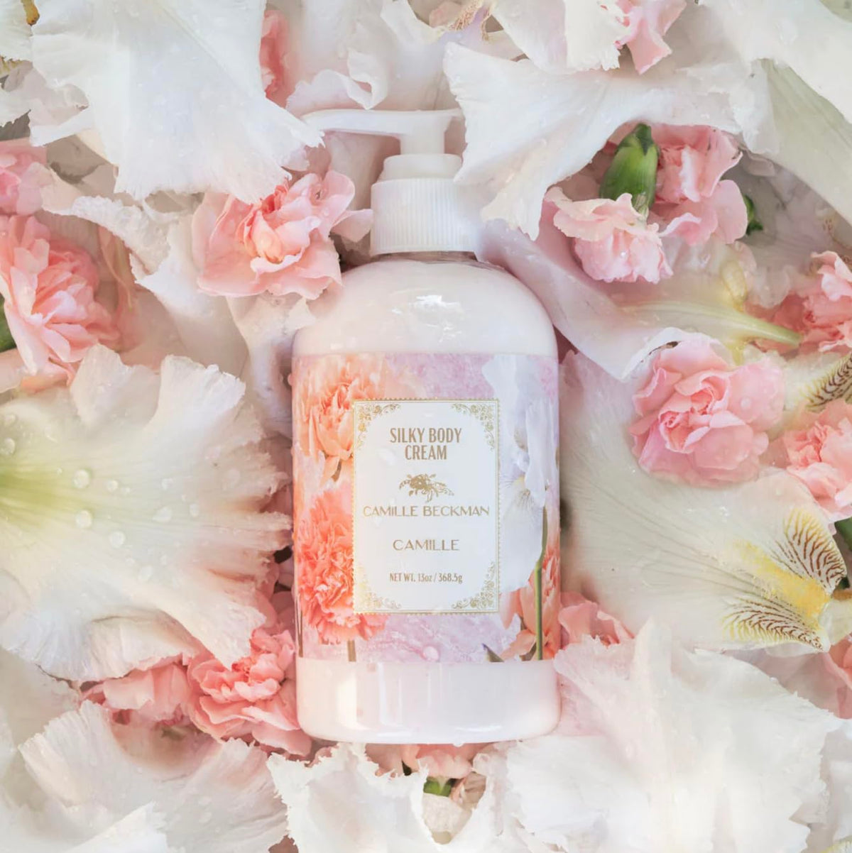 Camille Beckman Camille Scented Silky Body Cream hands applying for quick-absorbing moisture