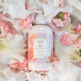 Camille Beckman Camille Scented Silky Body Cream hands applying for quick-absorbing moisture