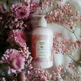 Camille Beckman Camille Scented Silky Body Cream texture-pour highlighting light non-greasy feel