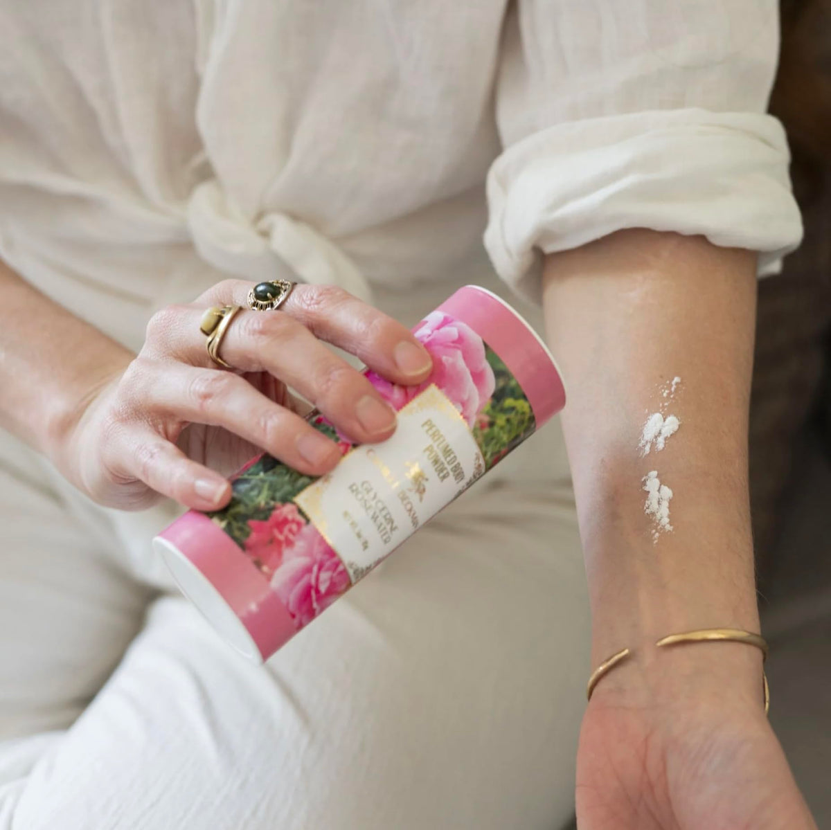 Camille Beckman rosewater powder fragrance evokes a soft, airy bloom.