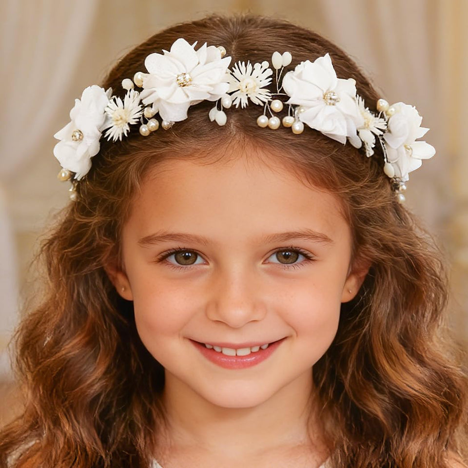 Campsis flower girl headpiece with crystal detail enhances wedding attire.