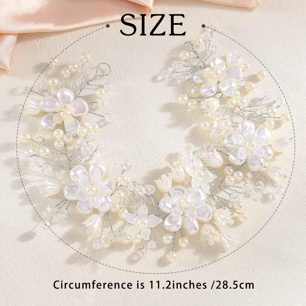 Campsis white floral hairpiece catching light for aisle moments