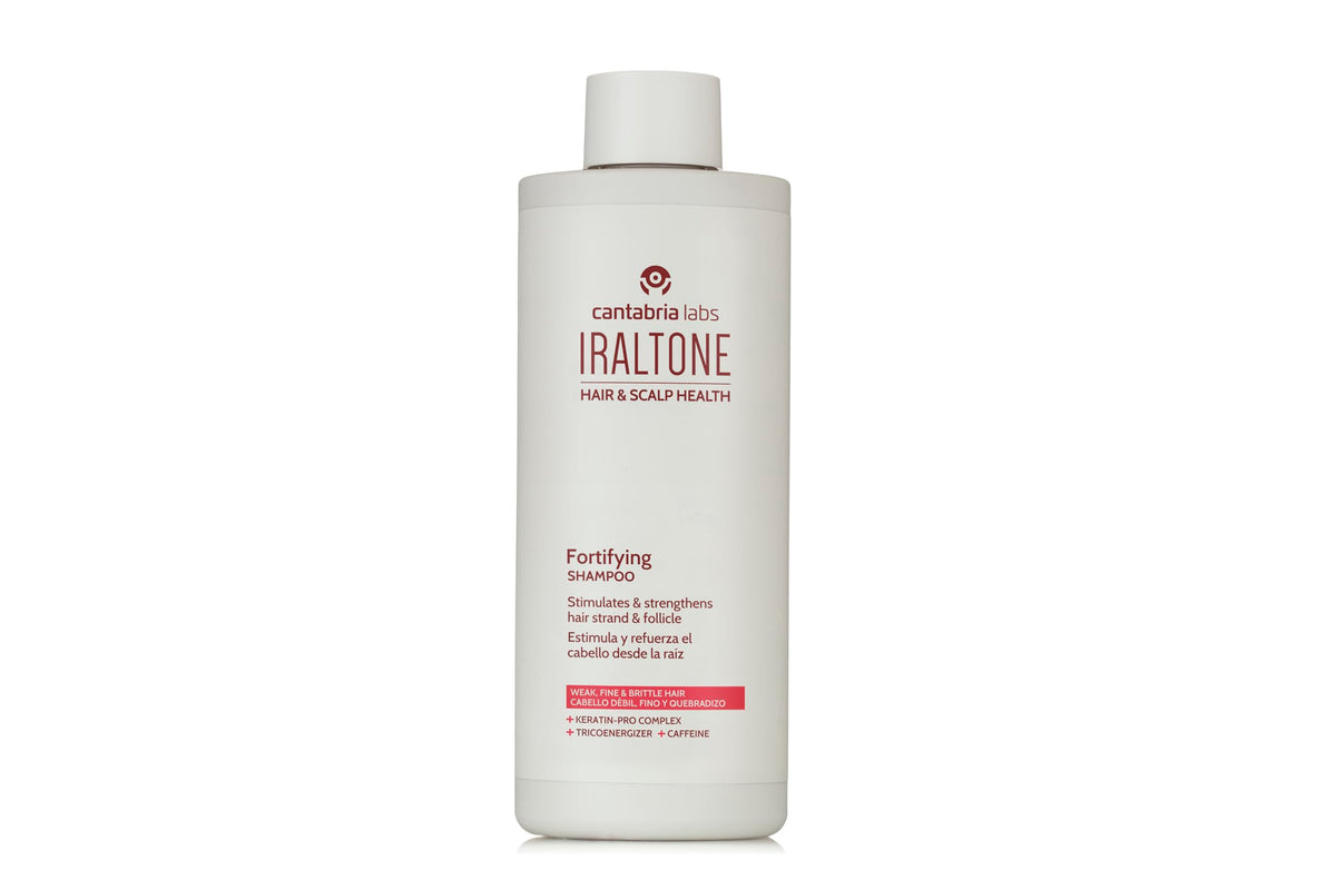 Cantabria Labs IRALTONE fortifying shampoo bottle shows scalp care and hair strength.