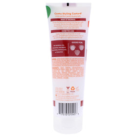 Cantu Styling Custard on textured hair demonstrates nourishment with shea butter and honey.