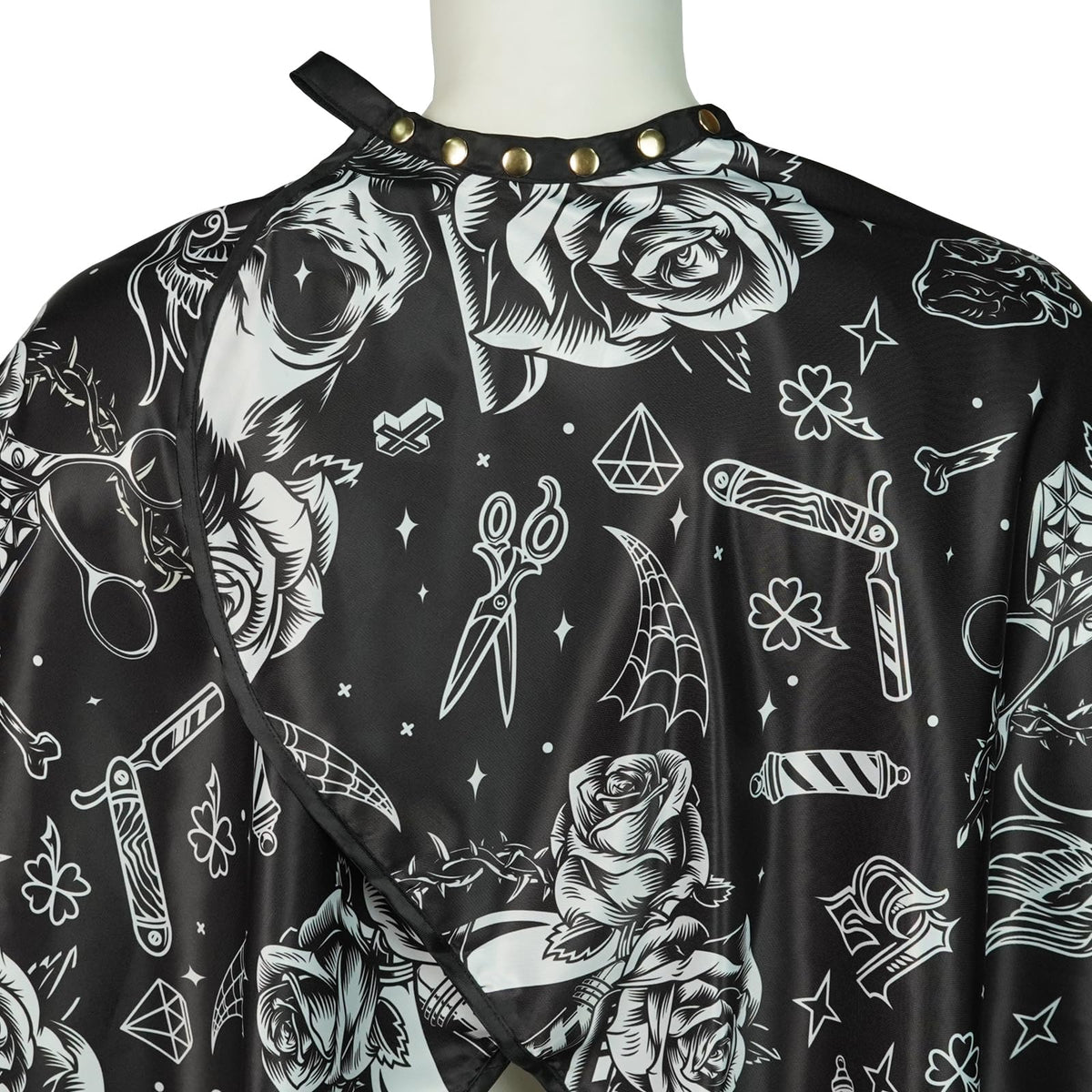 CapeshionPro barber cape showing water-resistant coating protects against liquids