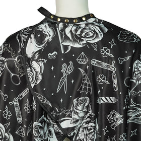 CapeshionPro barber cape showing water-resistant coating protects against liquids