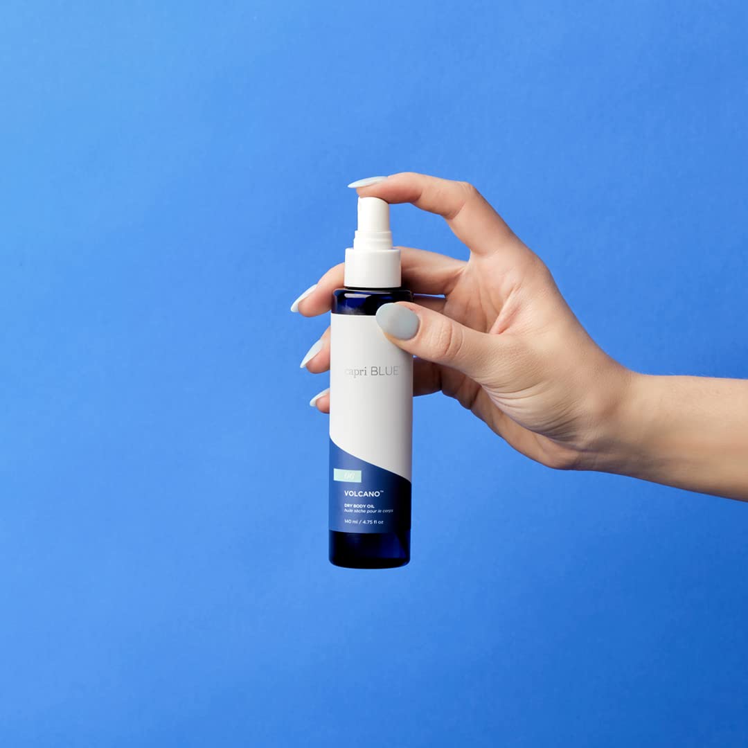 Capri Blue Blue Jean dry oil spray shows a non-greasy finish and fresh scent.