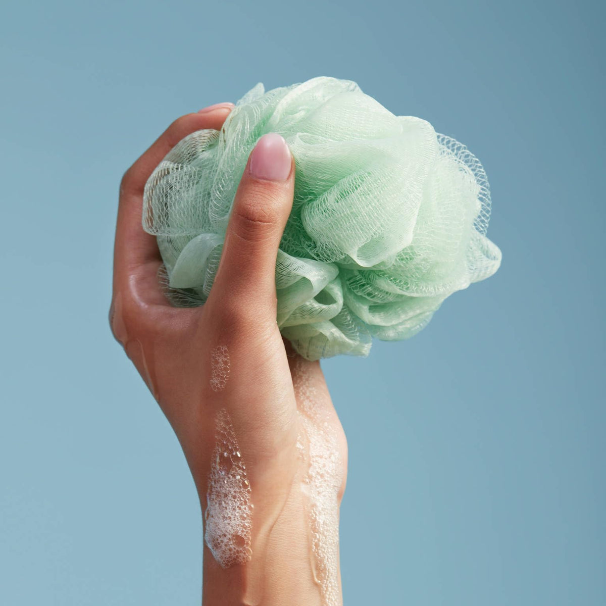 In-shower scene with Capri Blue Volcano body wash for a refreshing citrus-sugar scent