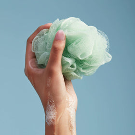 In-shower scene with Capri Blue Volcano body wash for a refreshing citrus-sugar scent