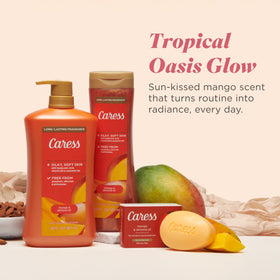 Caress mango-peach tropical fragrance note pictured with sunlit fruits.