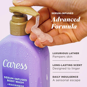 Caress Creamy Vanilla Blossom serum-infused bottle close-up showing hydration boost.