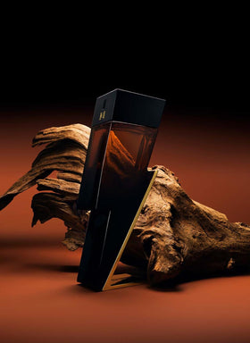 Carolina Herrera Bad Boy Elixir spray action demonstrating long-lasting projection.